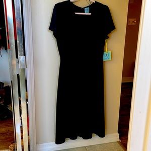 New CeCe Navy empire waist dress. Hand wash no need to go to the dry cleaners!